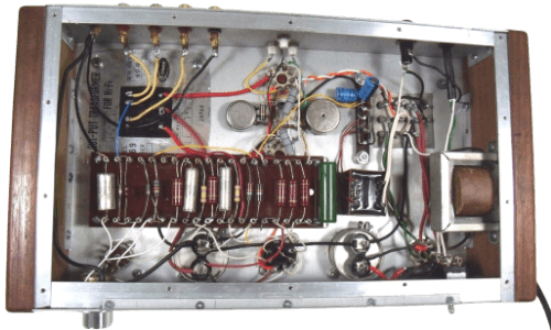 View of the inside wiring and components of an American Tube Amp monobloc amp. Very clean and neat.